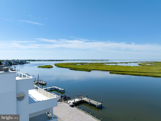 property view of water with a dock