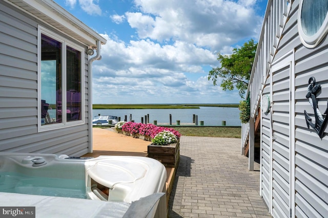 view of patio / terrace featuring a water view