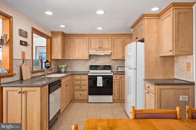 kitchen with light brown cabinets, sink, light tile patterned floors, white appliances, and tasteful backsplash