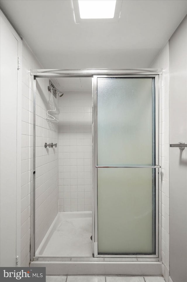 bathroom featuring walk in shower