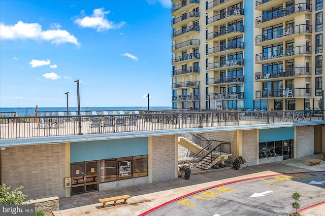 view of building exterior featuring a water view