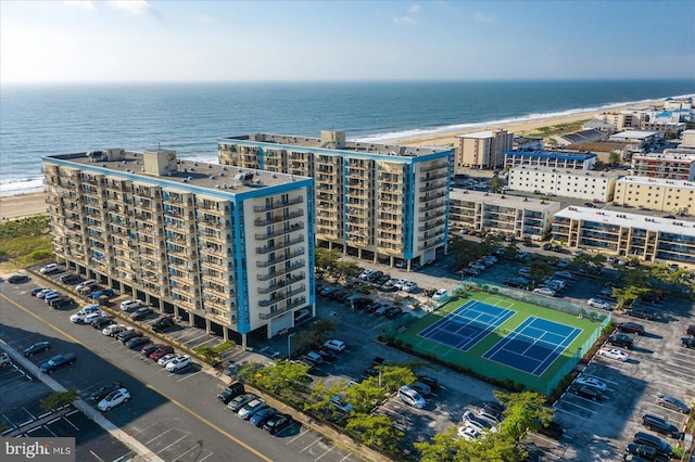 bird's eye view with a view of the beach and a water view