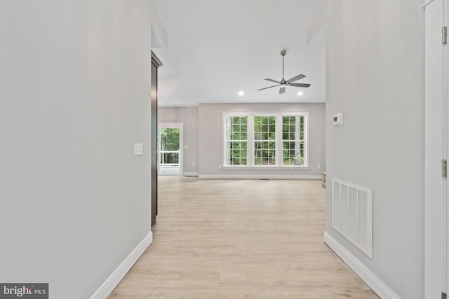 hallway featuring light hardwood / wood-style flooring