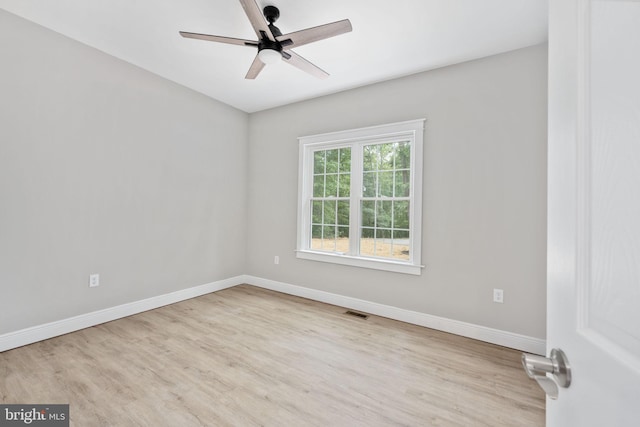 unfurnished room featuring ceiling fan and light hardwood / wood-style floors