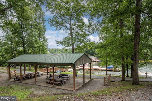 surrounding community featuring a water view