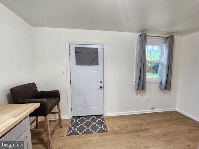 entrance foyer with light wood-type flooring