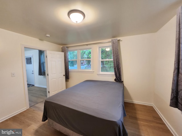 bedroom featuring hardwood / wood-style flooring