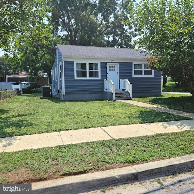 view of front of home with a front yard