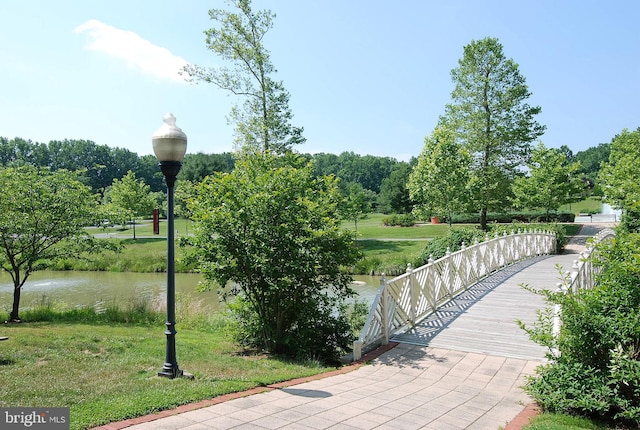 view of property's community featuring a water view