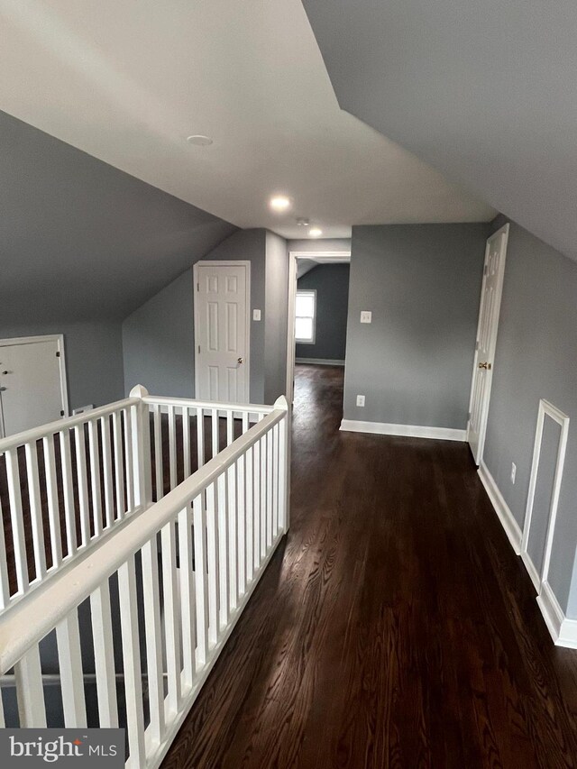 empty room with hardwood / wood-style flooring