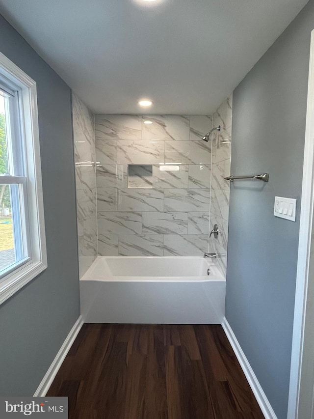 bathroom featuring vanity, hardwood / wood-style flooring, and toilet