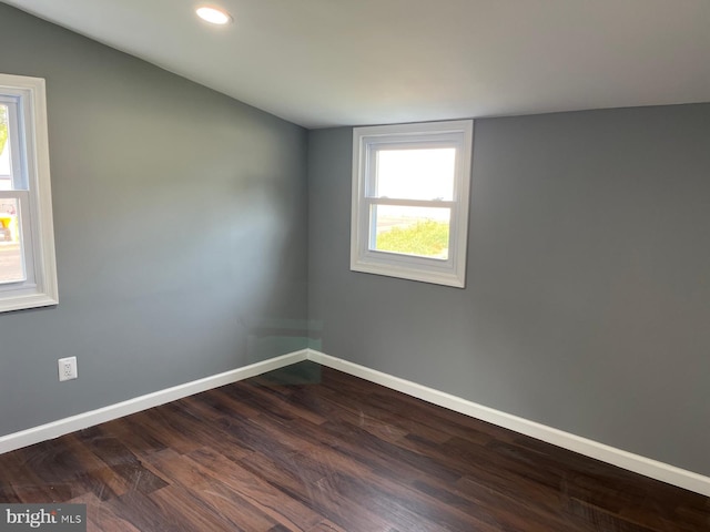 unfurnished room featuring wood-type flooring