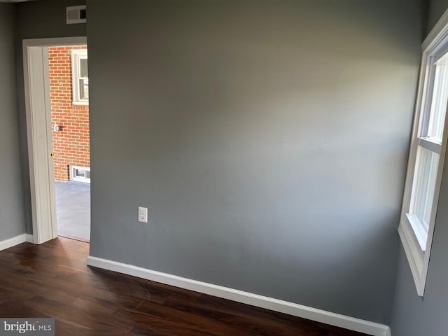 empty room featuring hardwood / wood-style floors