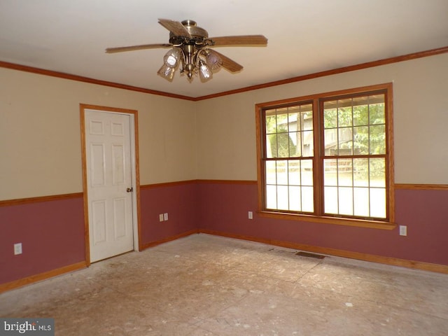 unfurnished room featuring crown molding and ceiling fan