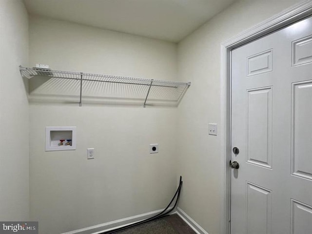 clothes washing area with washer hookup and hookup for an electric dryer