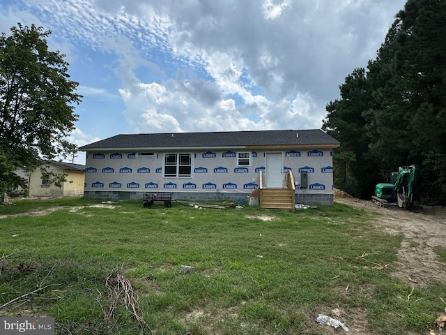 exterior space with a front lawn