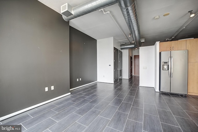 empty room featuring dark hardwood / wood-style floors