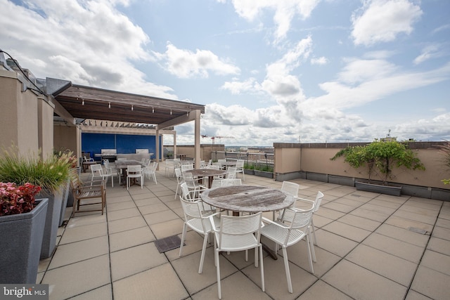 view of patio featuring a pergola