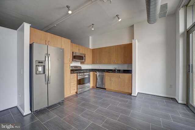 kitchen featuring appliances with stainless steel finishes and sink