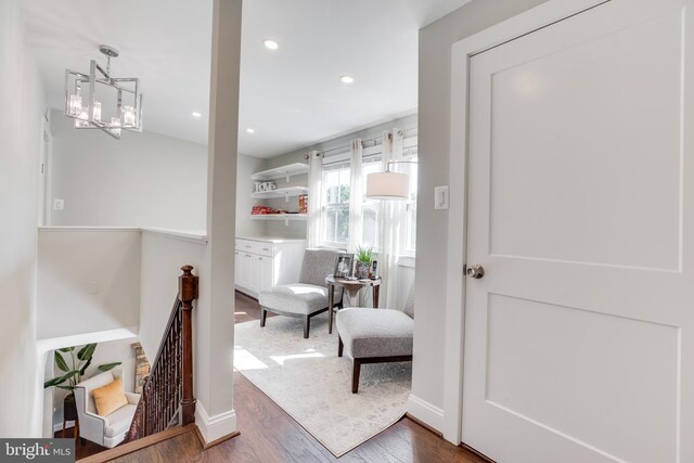 living area with dark hardwood / wood-style flooring