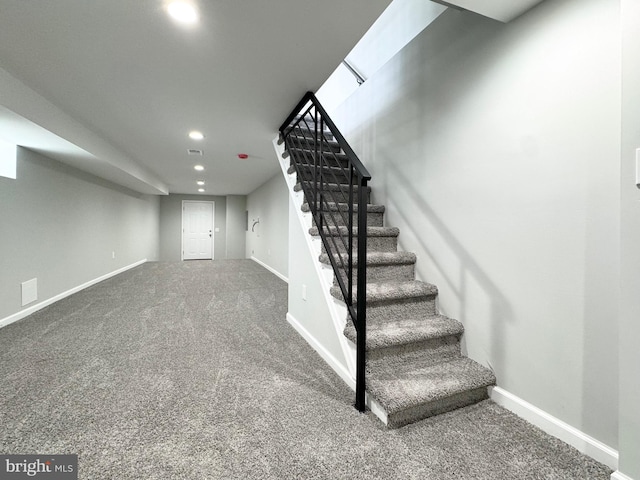 stairway with carpet floors