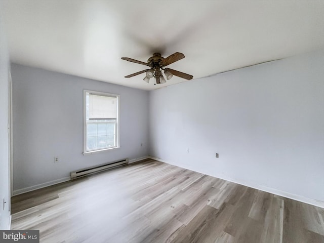 unfurnished room featuring ceiling fan, baseboard heating, and light wood-type flooring