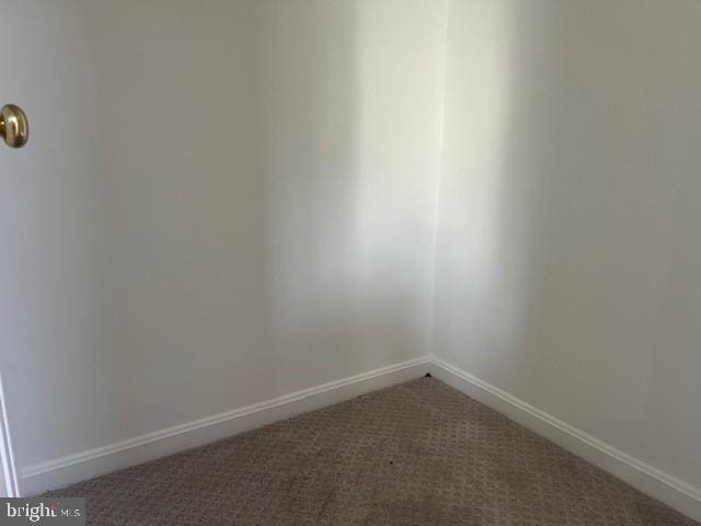 unfurnished room with carpet floors