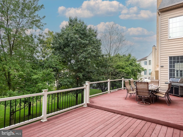 wooden deck with grilling area