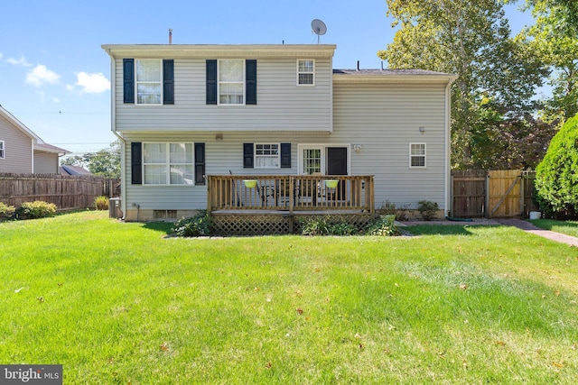 view of front facade with a wooden deck and a front lawn