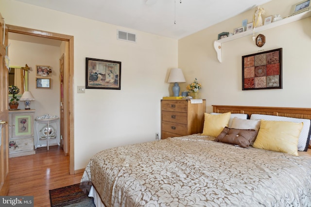 bedroom featuring dark wood-type flooring