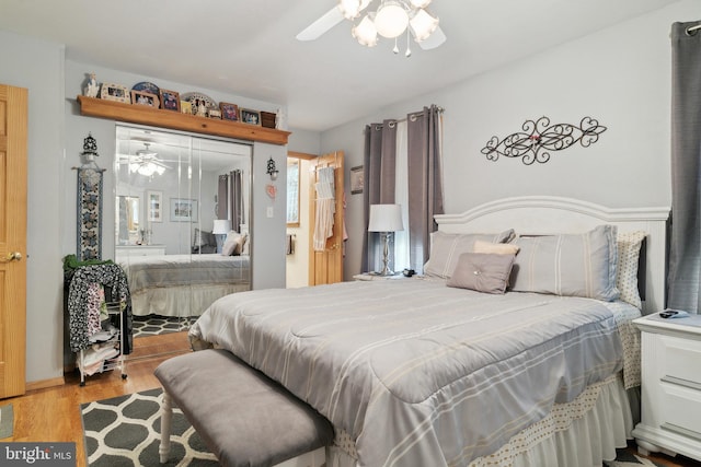 bedroom featuring light wood-type flooring and ceiling fan