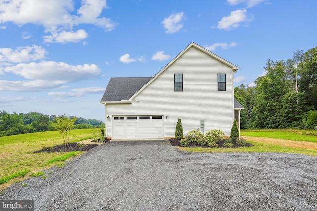 view of property exterior with a garage and a yard