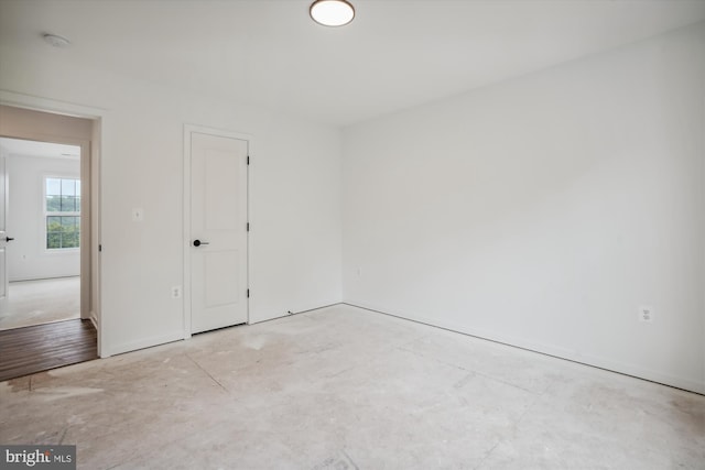 unfurnished bedroom with light wood-type flooring