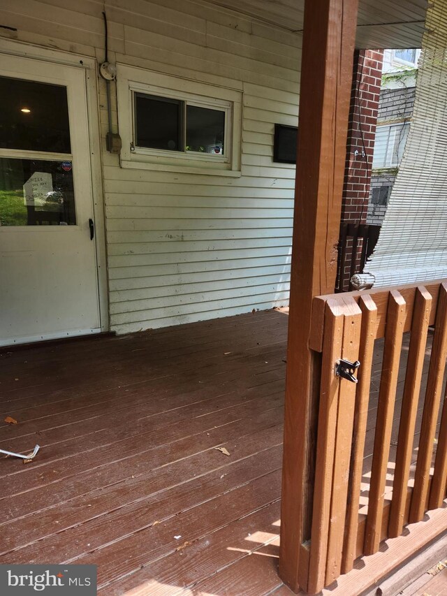 doorway to property with a deck