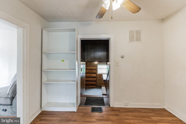 interior space featuring ceiling fan and hardwood / wood-style flooring