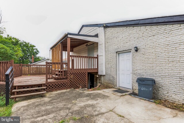 exterior space featuring a wooden deck