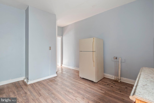 interior space with hardwood / wood-style flooring