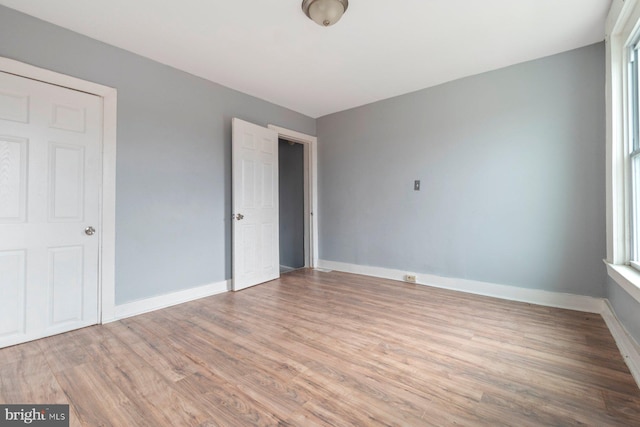 unfurnished bedroom featuring light hardwood / wood-style floors