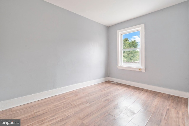 empty room featuring light hardwood / wood-style floors