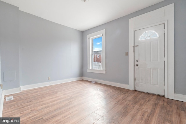 entrance foyer with light hardwood / wood-style flooring