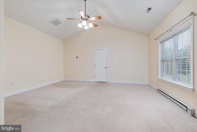 carpeted empty room with ceiling fan, vaulted ceiling, and a baseboard radiator