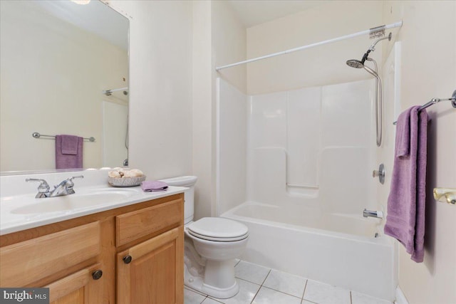 full bathroom with bathing tub / shower combination, vanity, tile patterned floors, and toilet