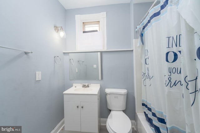 full bathroom featuring vanity, toilet, and shower / bathtub combination with curtain