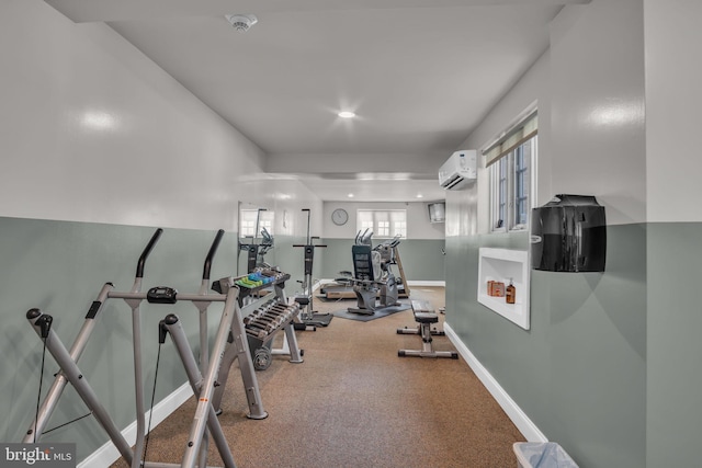 workout area featuring carpet flooring and a wall mounted air conditioner