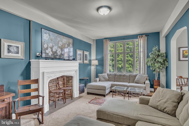 living room featuring light carpet