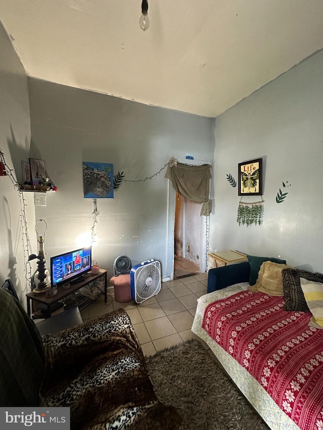 bedroom with light tile patterned flooring