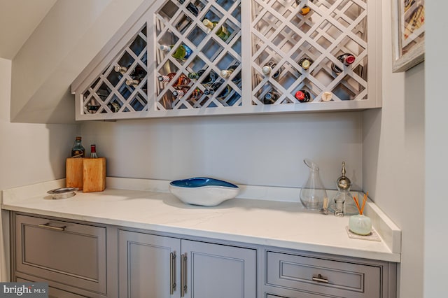 bar featuring gray cabinets