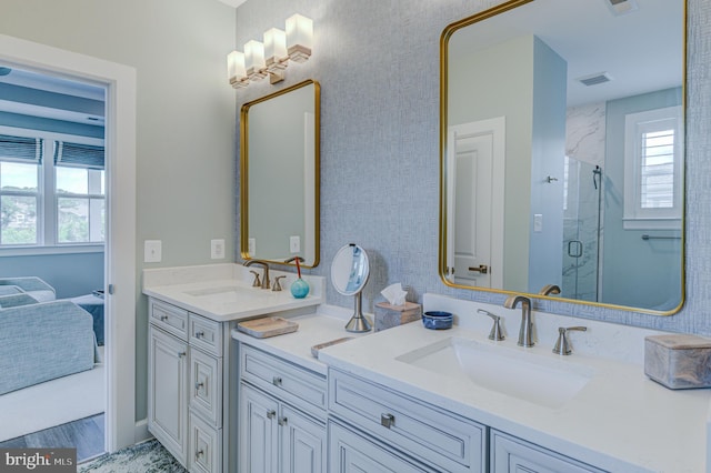 bathroom featuring vanity, an enclosed shower, and hardwood / wood-style floors