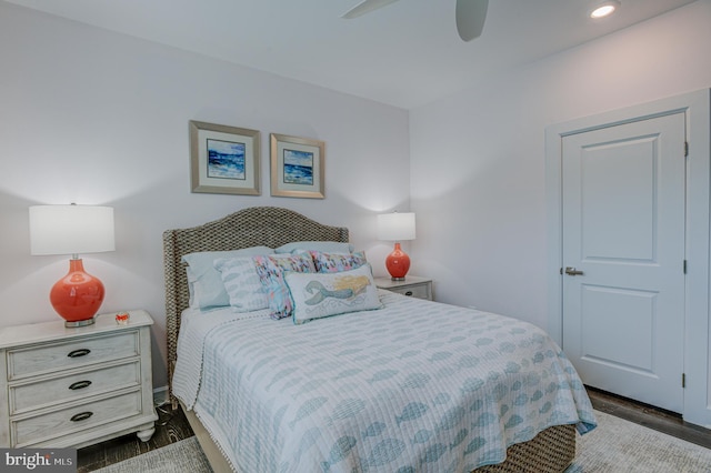 bedroom featuring dark wood-type flooring and ceiling fan