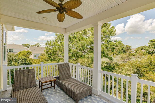 wooden terrace with ceiling fan